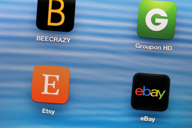 Hong Kong, Hong Kong  - April 18, 2013: Ipad with shopping application of beecrazy, groupon, etsy and ebay